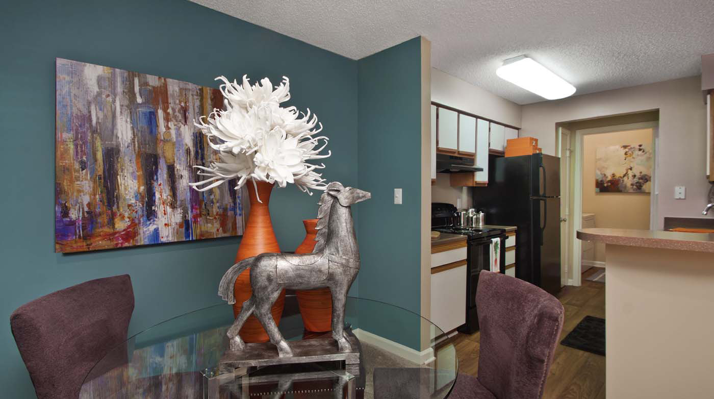 Open dining and kitchen areas.