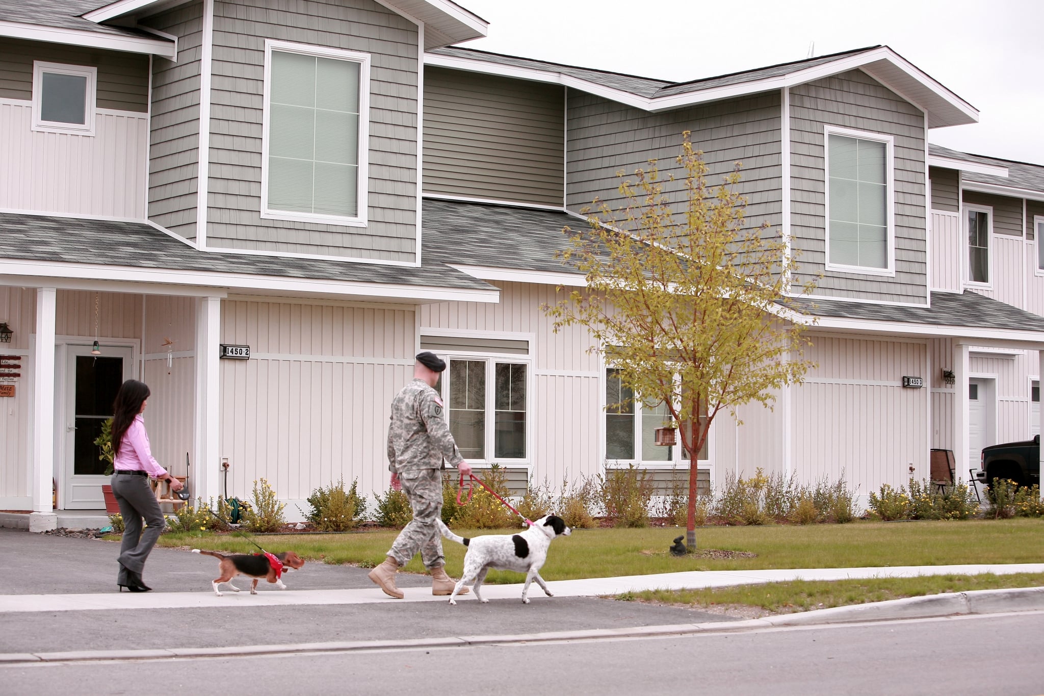 2 Winn residents walking their dogs
