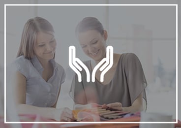 Hands icon with two women in background